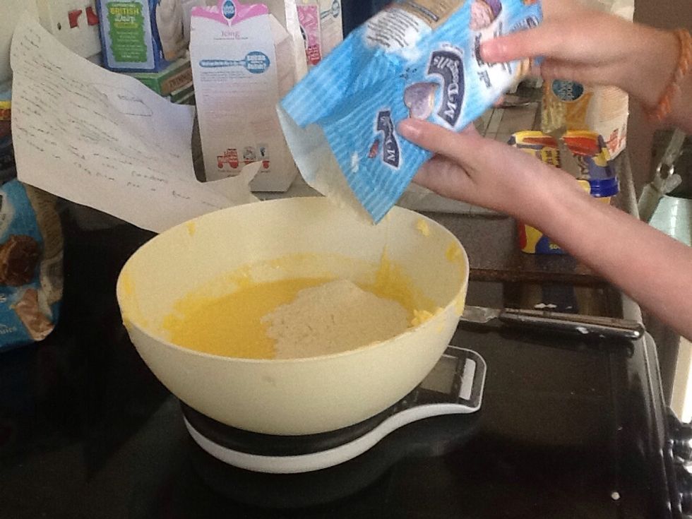 Now add 250 grams of self raising flour