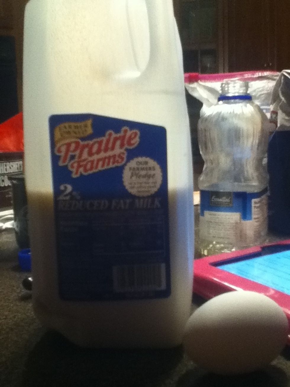 now add 3 tablespoons of milk and an egg
