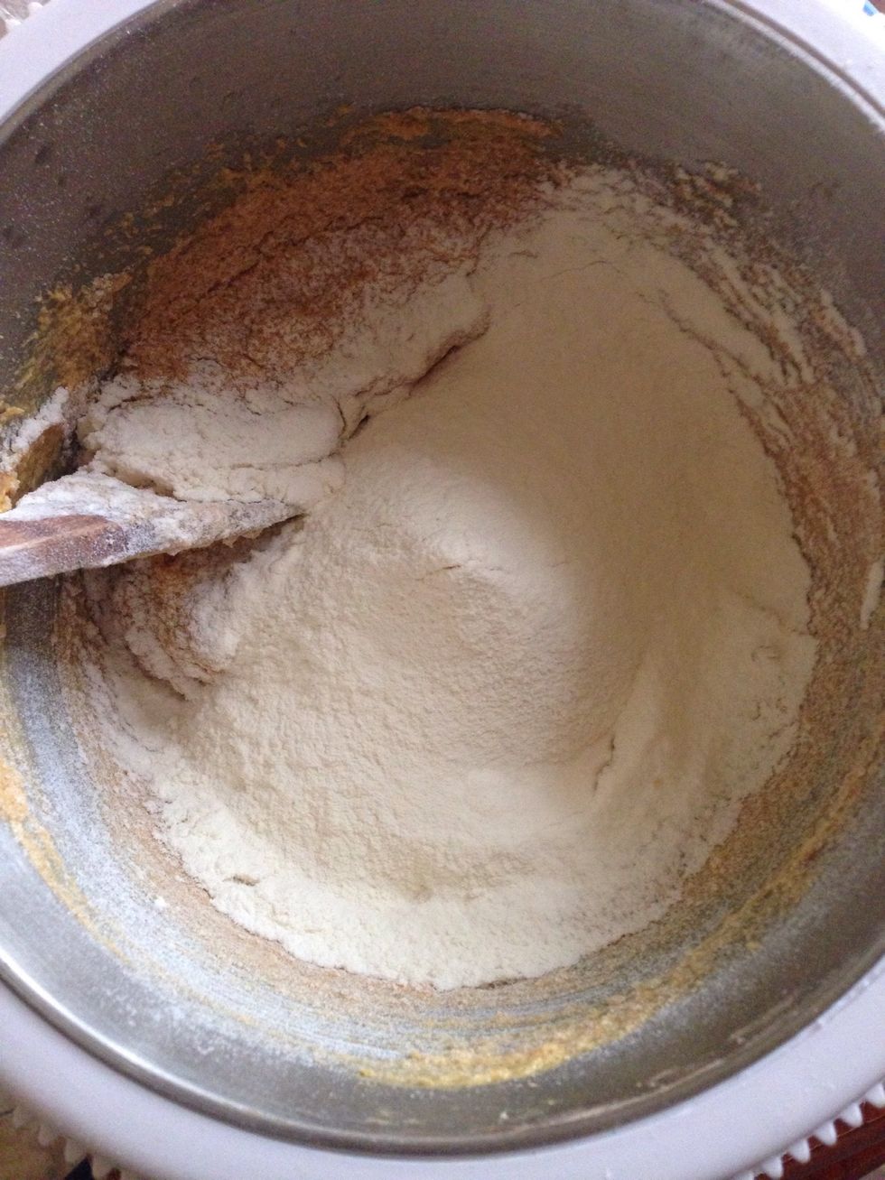 Now add 3cups of flour and a pinch of salt