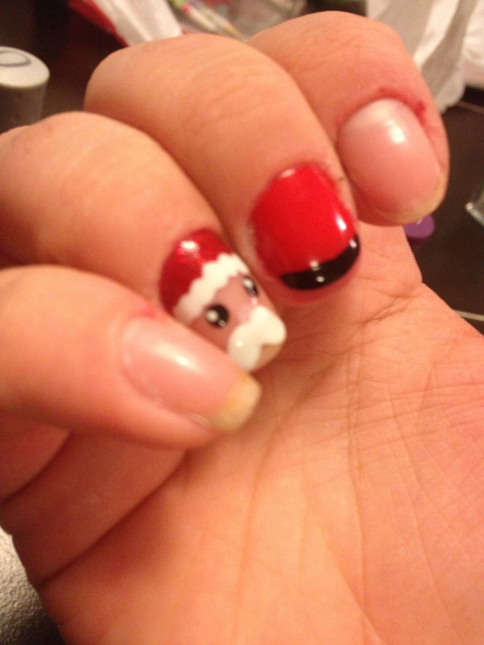 Now add a Red nail with a black tip