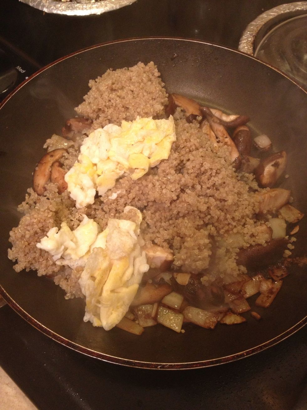 Now add a scoop of quinoa and add back the egg.