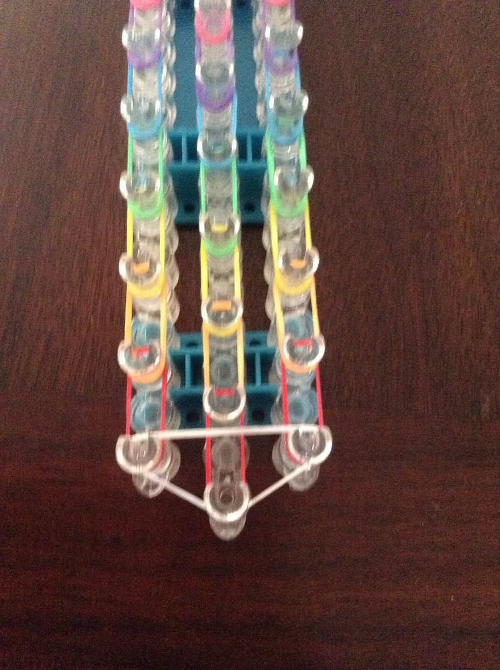 Now add a white band with a formation like a arrow