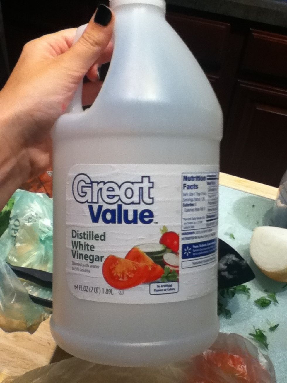 Now add about 2 tablespoons worth of white vinegar and pour that into the bowl.