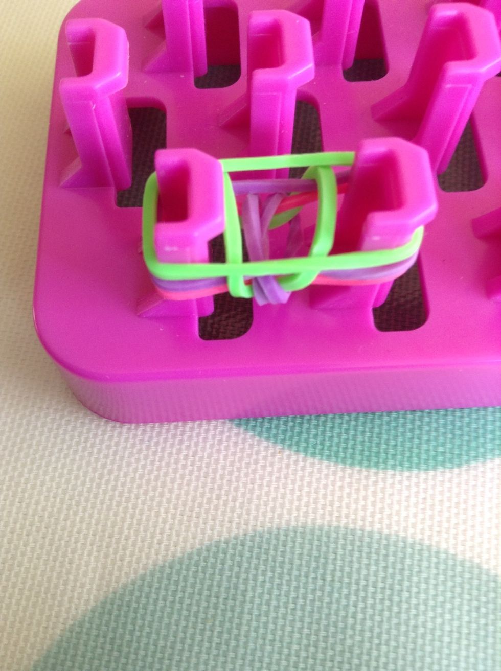 Now add another band of the same colour as the last one you looped (green)