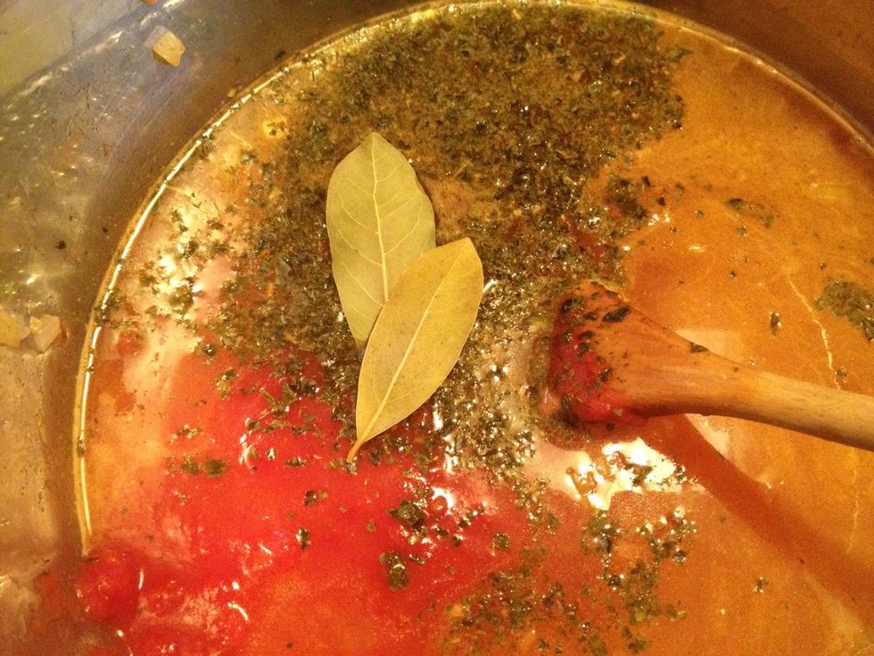 Now add bay leaves and basil (I used frozen).