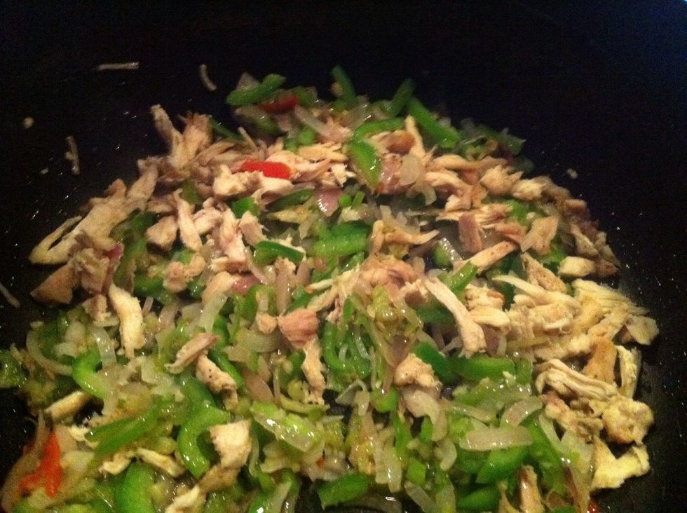 now add chicken which is initially boiled by adding garlic ginger powder and pinch of salt and pepper.. and then shred it.. sorry forgot to take picture of that..