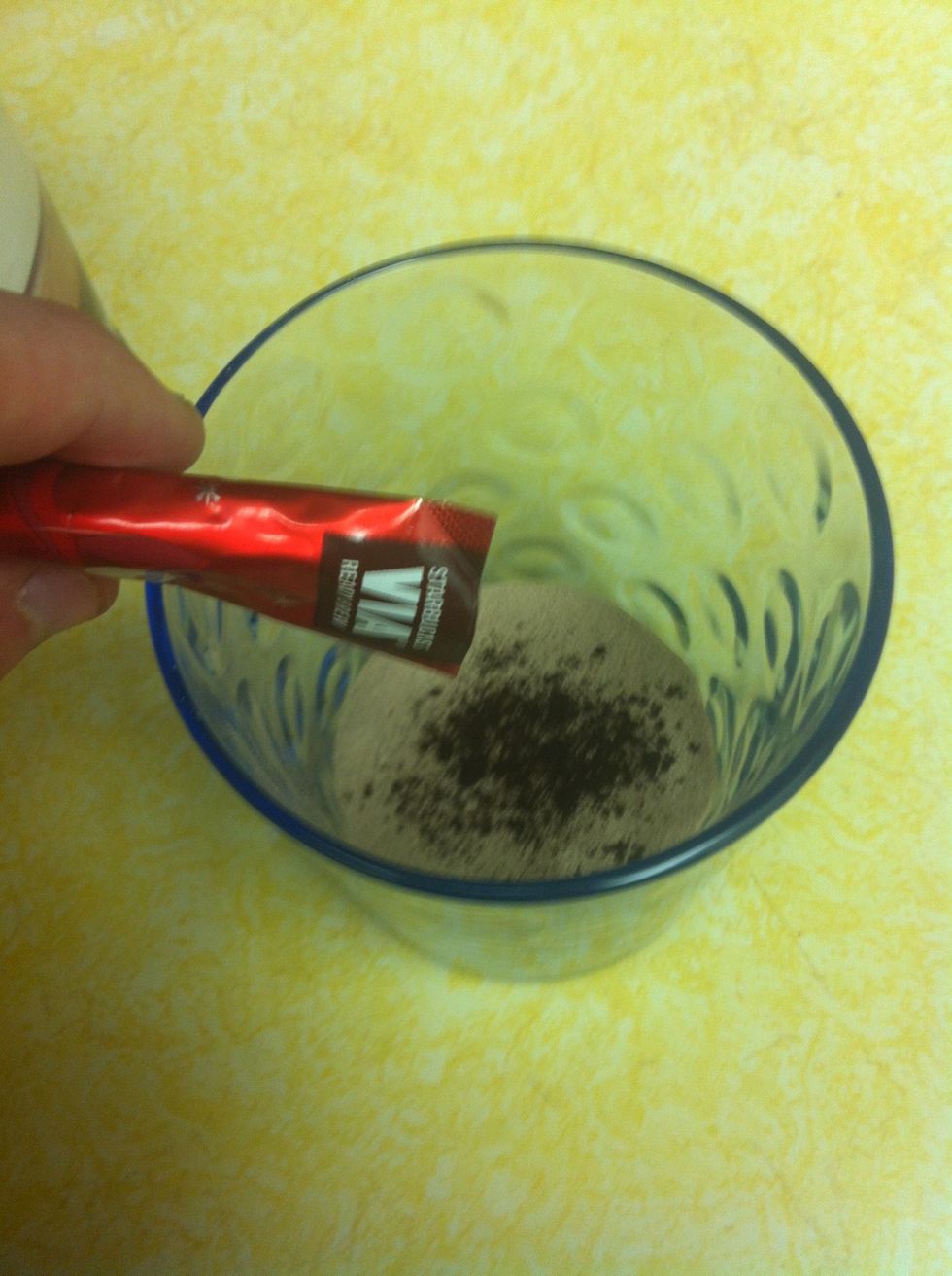 Now add in a little bit of Coffee into the Cocoa mix. Don't use whole packet! Amount of coffee used is dependent on how strong you'd like the drink to be.