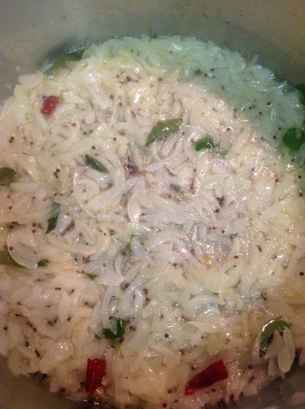 Now add in curry leaves and dry red chillies. In this recipe, I did not add in too many chilies as the heat is up to your own preference. You want it robust in flavour but not intense on heat.