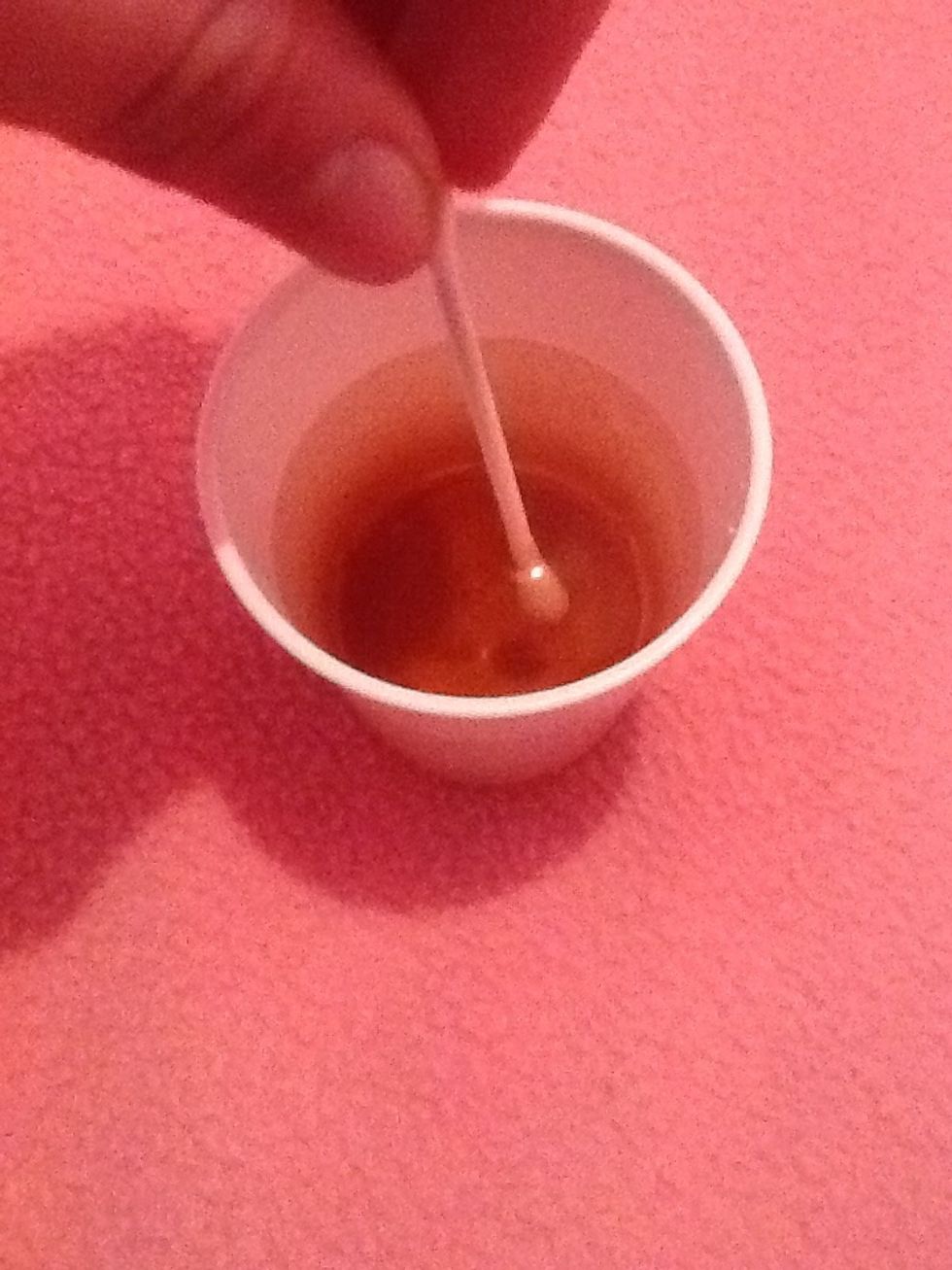 Now add in the extract and stir using your q tip.