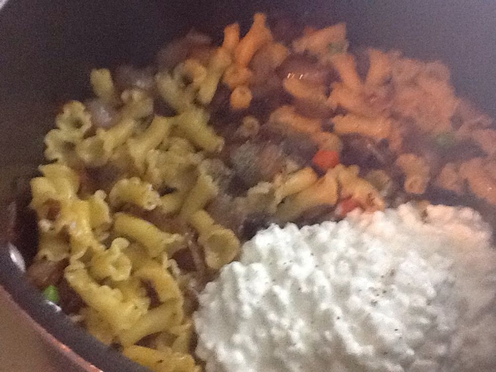 Now add milk, cheese, salt and pepper; then on medium low heat stir until the cheese has melted.