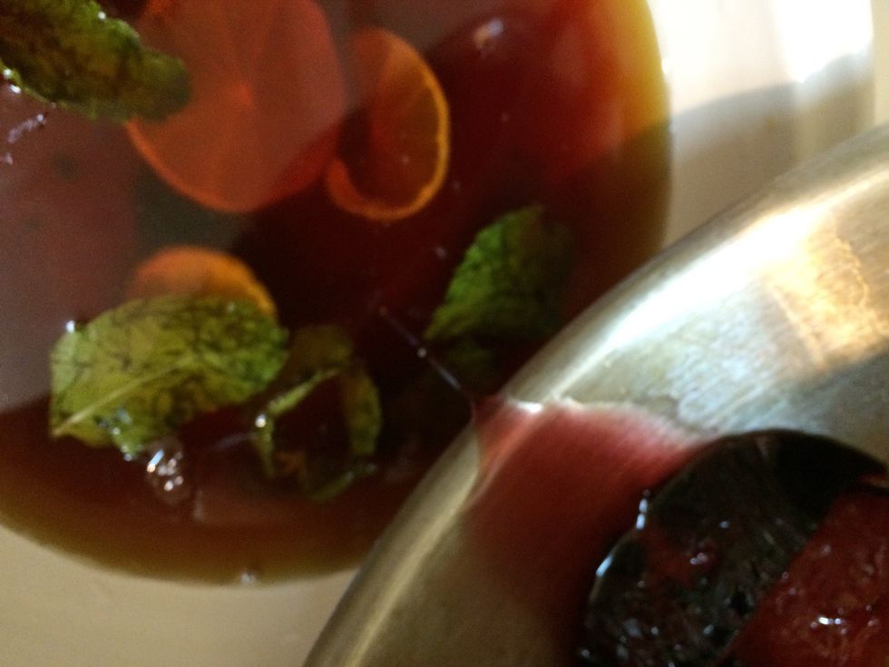 Now add plum syrup along with plum slices