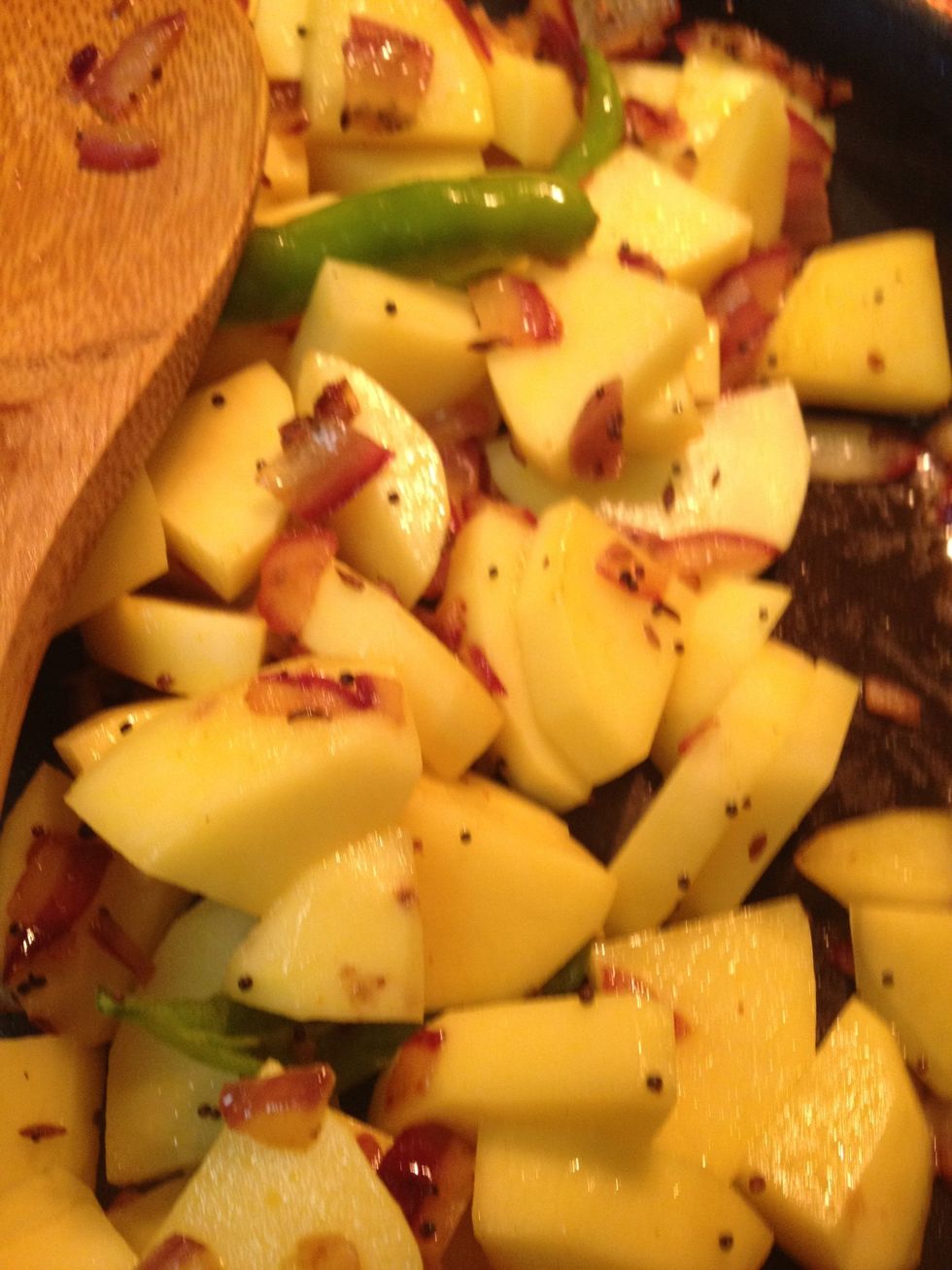 Now add potatoes and mix them well