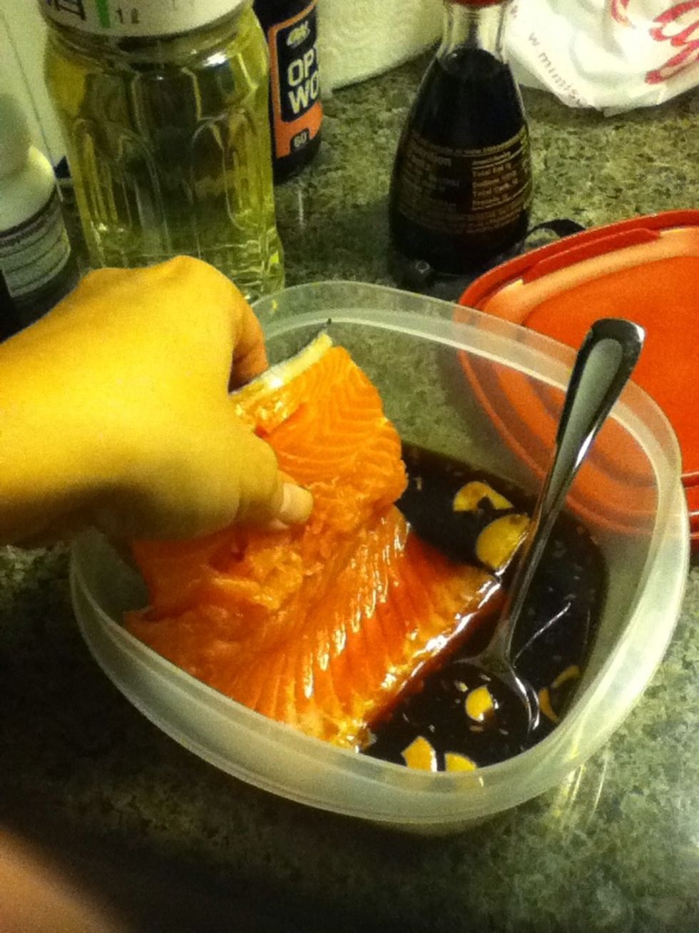 Now add salmon to marinate. It's ok if the sauce doesn't completely covers the salmon.