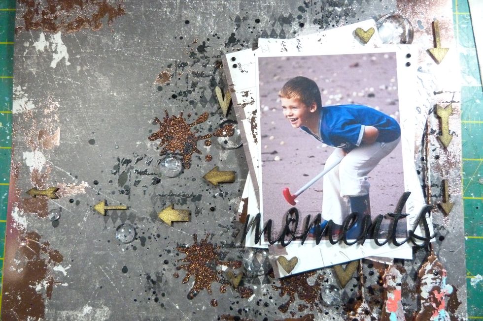 Now add some arrows across the layout from the photo on right towards the left hand side, together with some of the glass domes. Lastly add some black crystals to two top corners of the PP layers