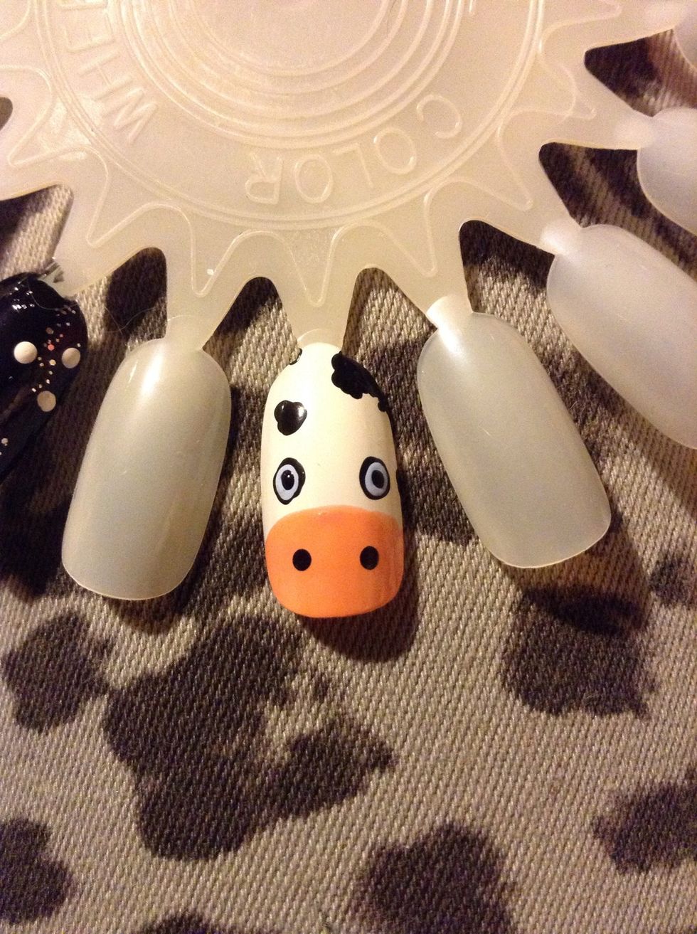 Now add some black dots inside
