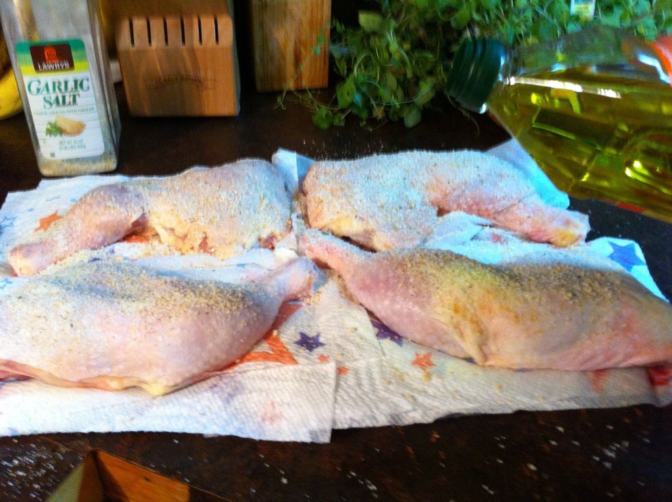 Now add some fat. I'm using olive oil. Massage that in the chicken.