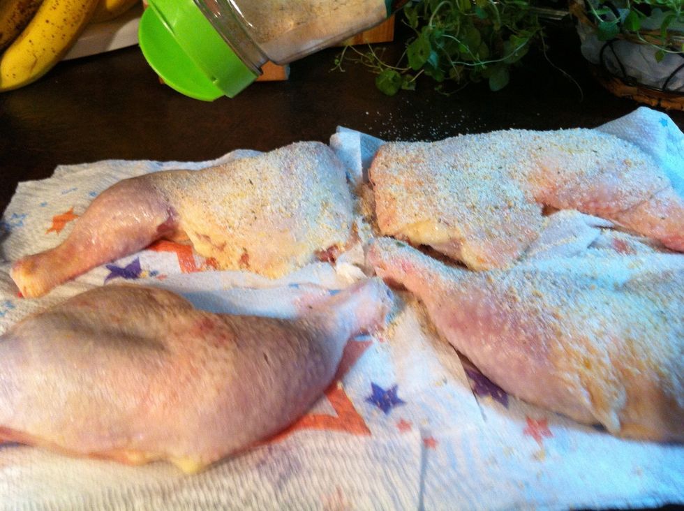 Now add some flavor! I sprinkled with garlic salt. But the possibilities are endless of the flavors you can create. Massage in the chicken.