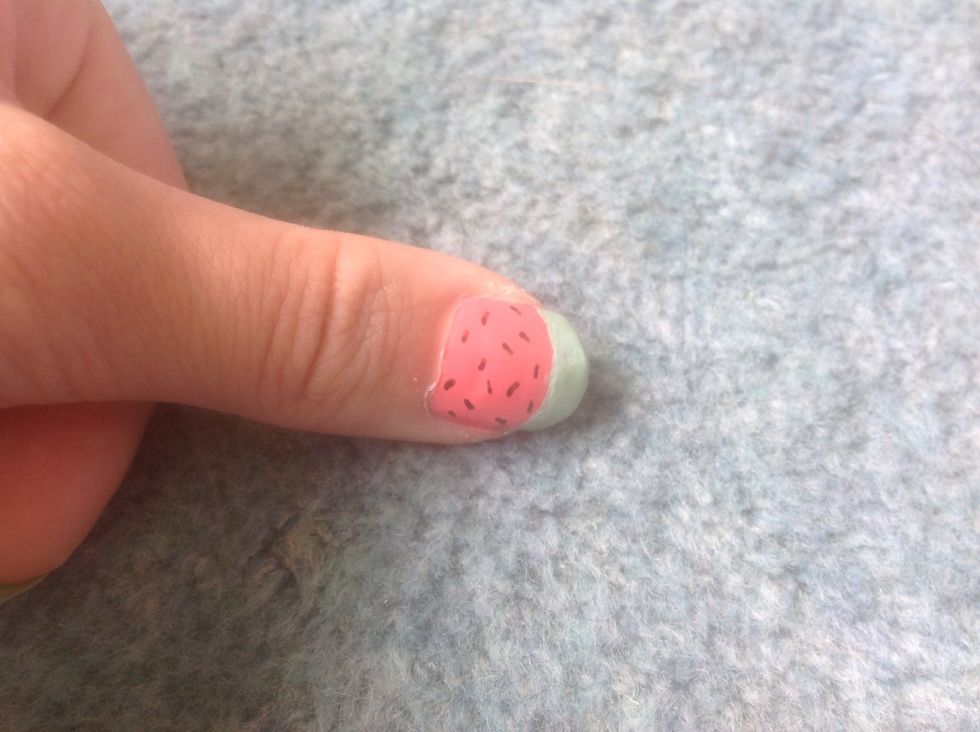 Now add some short black lines for the seeds in our watermelon