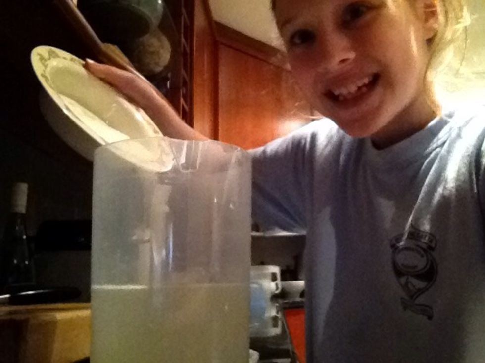 Now add the 100g of sugar into the lemonade and stir well with a teaspoon.