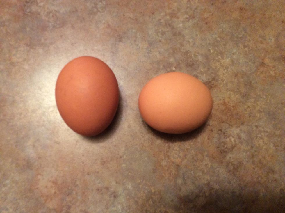 Now add the 2 raw eggs into the bowl as well.