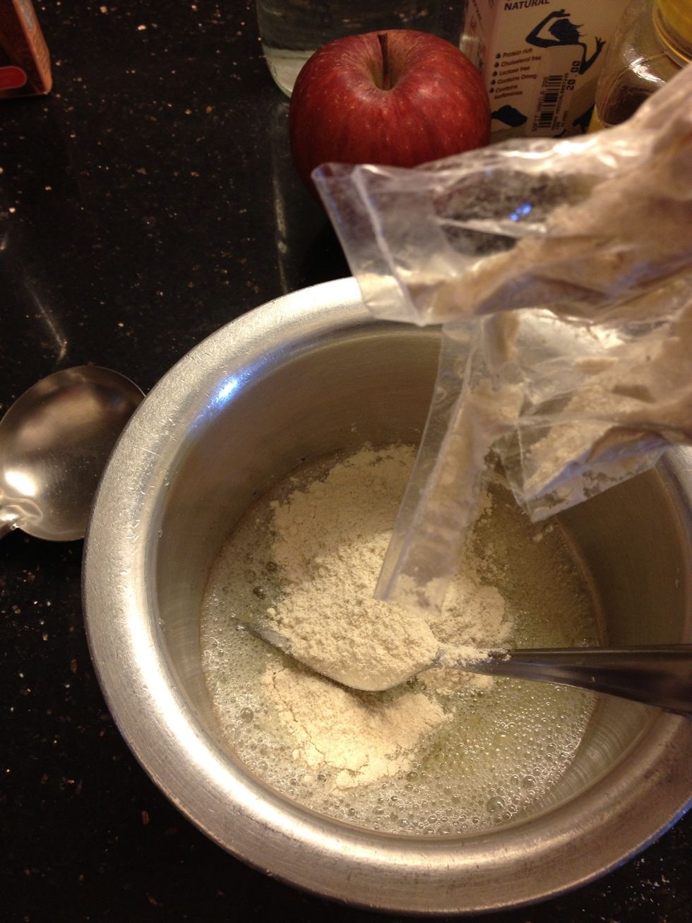 Now add the Amaranth flour, soy milk, desiccated coconut, salt, baking powder and water( if needed) and mix well to remove all lumps.