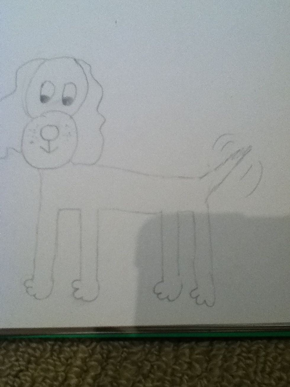 Now add the back and the tail. You can make the line jagged on the tail if you want it furry and you can add lines to make the tail wag.