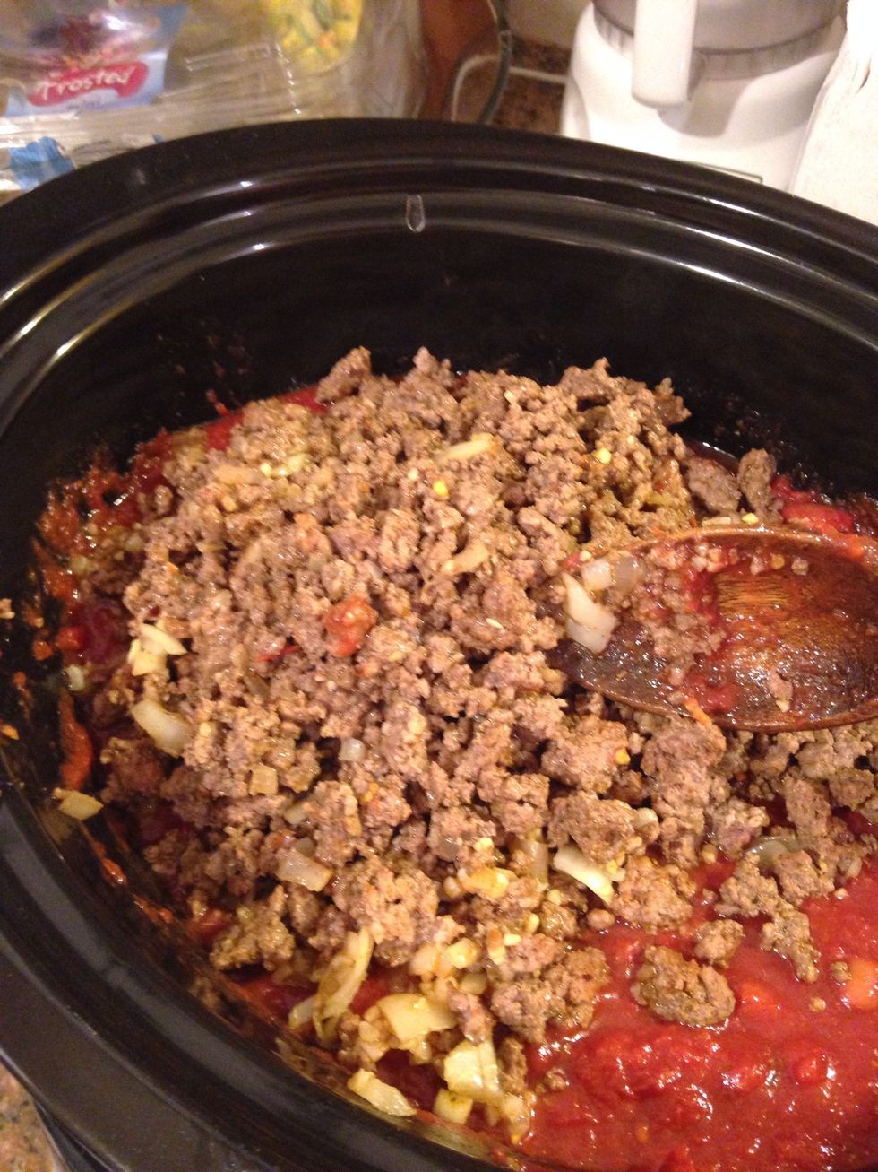 Now add the beef and onion mixture. You can drain the meat or use a slotted spoon so the grease is off.