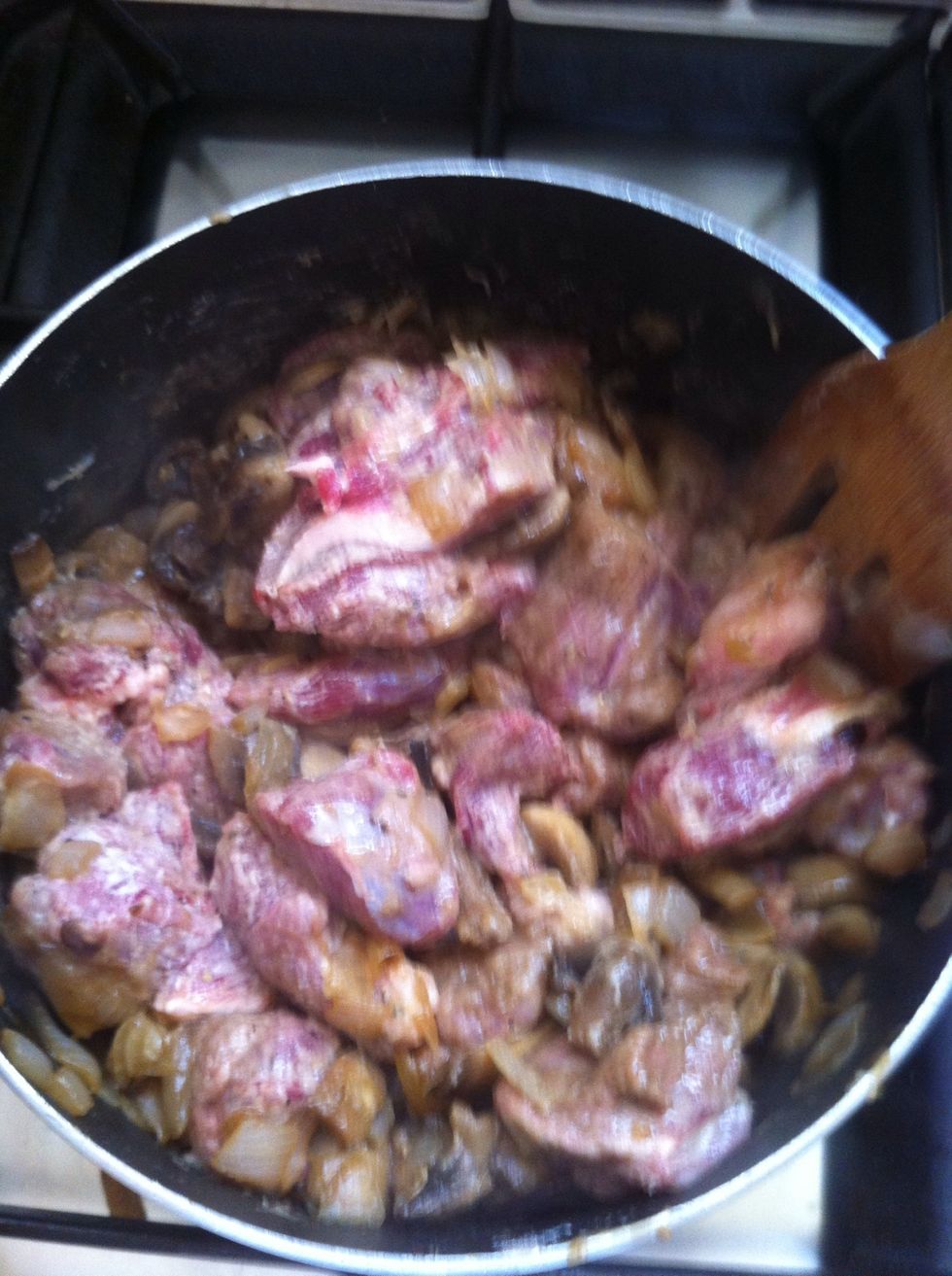 Now add the beef and start cooking it until all the pieces are browned (important) at this point add a pinch of rosemary and any herbs or spices you need to taste in this.