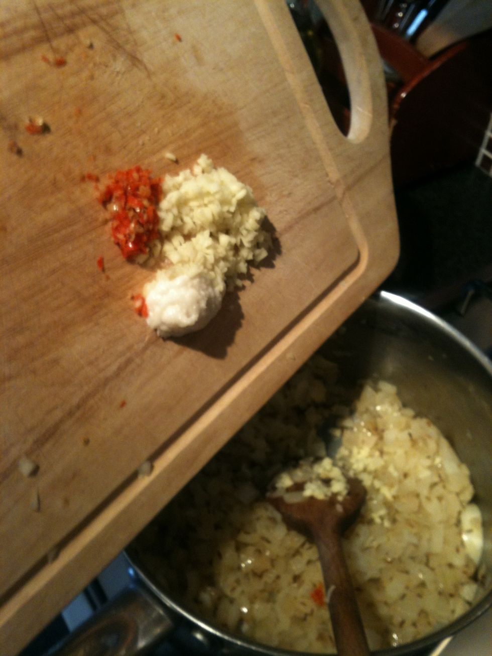 Now add the chilli, garlic and ginger. I have used the Prairie fire chilli. You can use what ever type you like and as much as you like in this dish.