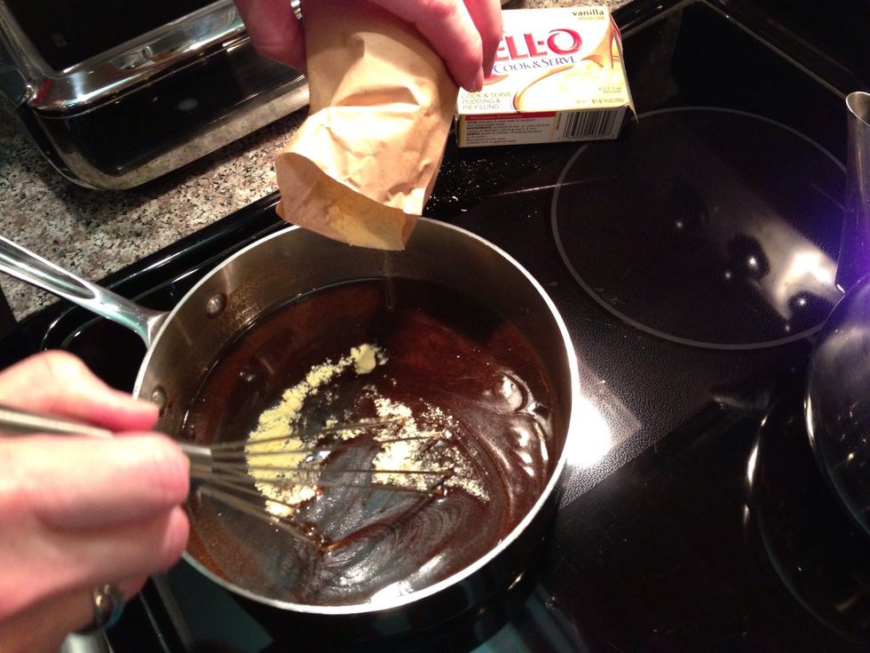 Now add the contents of the vanilla pudding box and stir it in. Continue stirring until it's all well blended. Then take it off the heat.