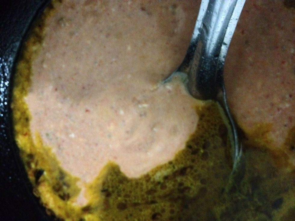Now add the curd mix . Keep the gas on very setting.