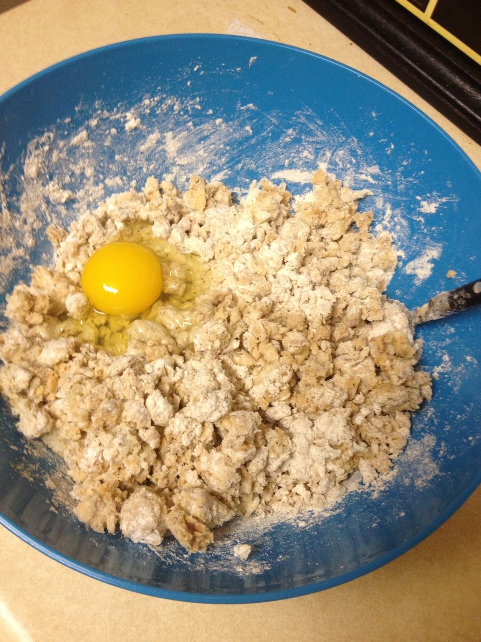 Now add the egg and stir it all together. (It may be easier if you whisk the egg in a separate bowl first and then add it if you'd like.)