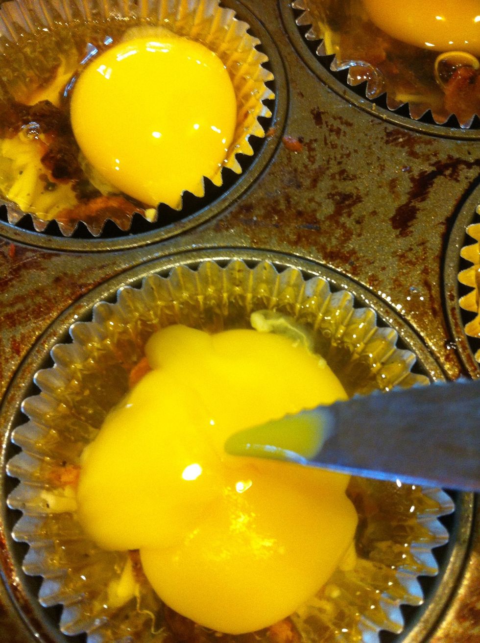 Now add the eggs. Use something sharp to puncture the yolk. Otherwise it puffs up quiet a bit. I check the eggs as they bake to make sure they aren't bubbling up.