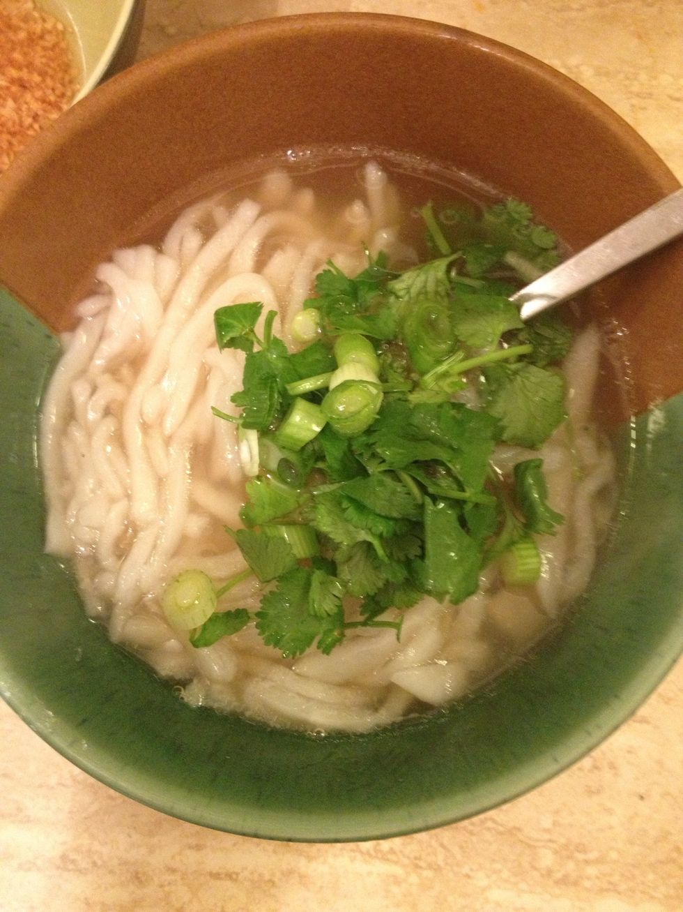 Now add the fresh greens! Squeeze in a lime wedge too!