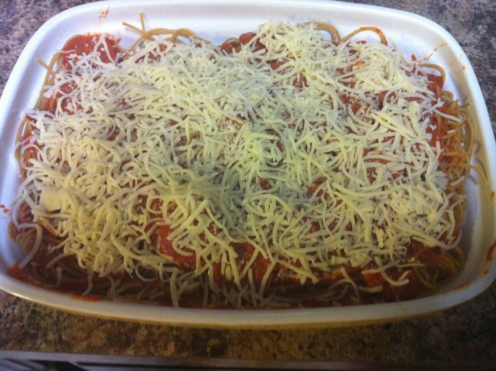 Now add the last layer of cheese. Make it generous as the next step is baking and it's easier to see the proper coloring of the cheese when it's done