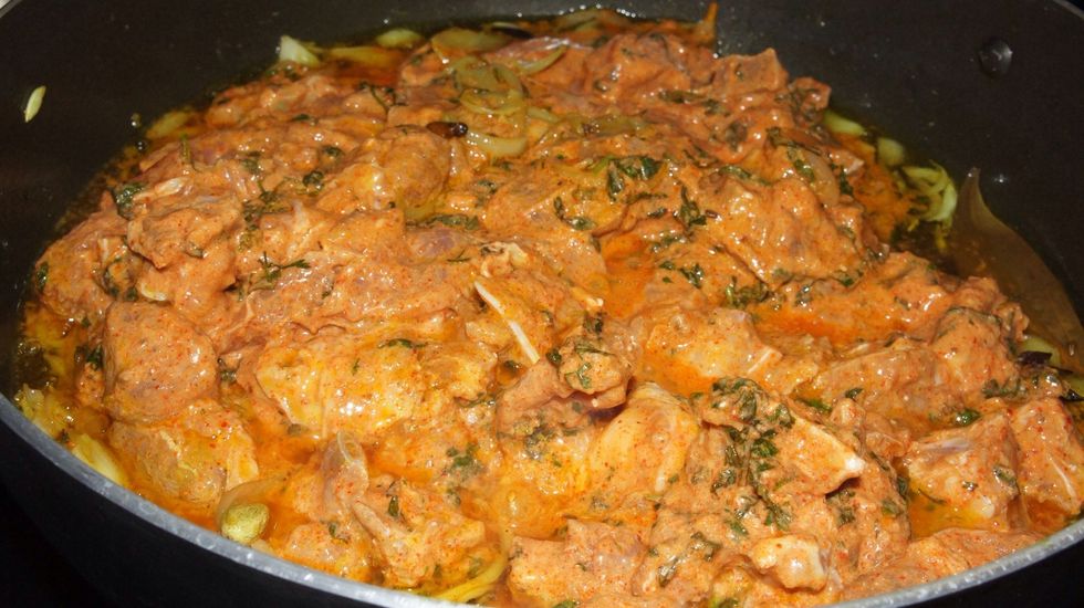 Now add the marinated mixture to the big pan...