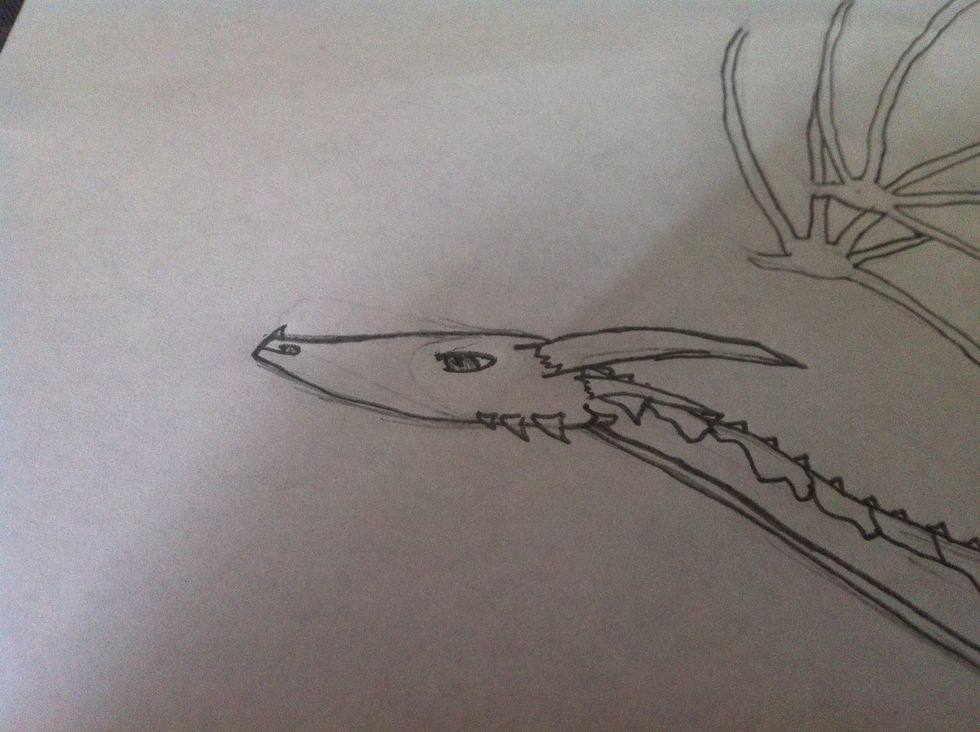 Now add the nose ( make sure u shade in side it) and add the eyes ( ur choice of design really )