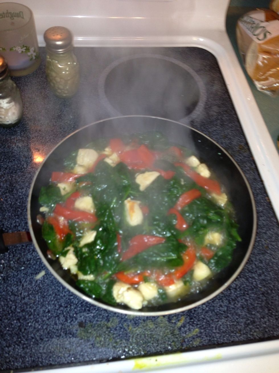 Now add the pesto sauce, I add about three spoonfuls. Simmer another five minutes, then toss with the penne pasta.