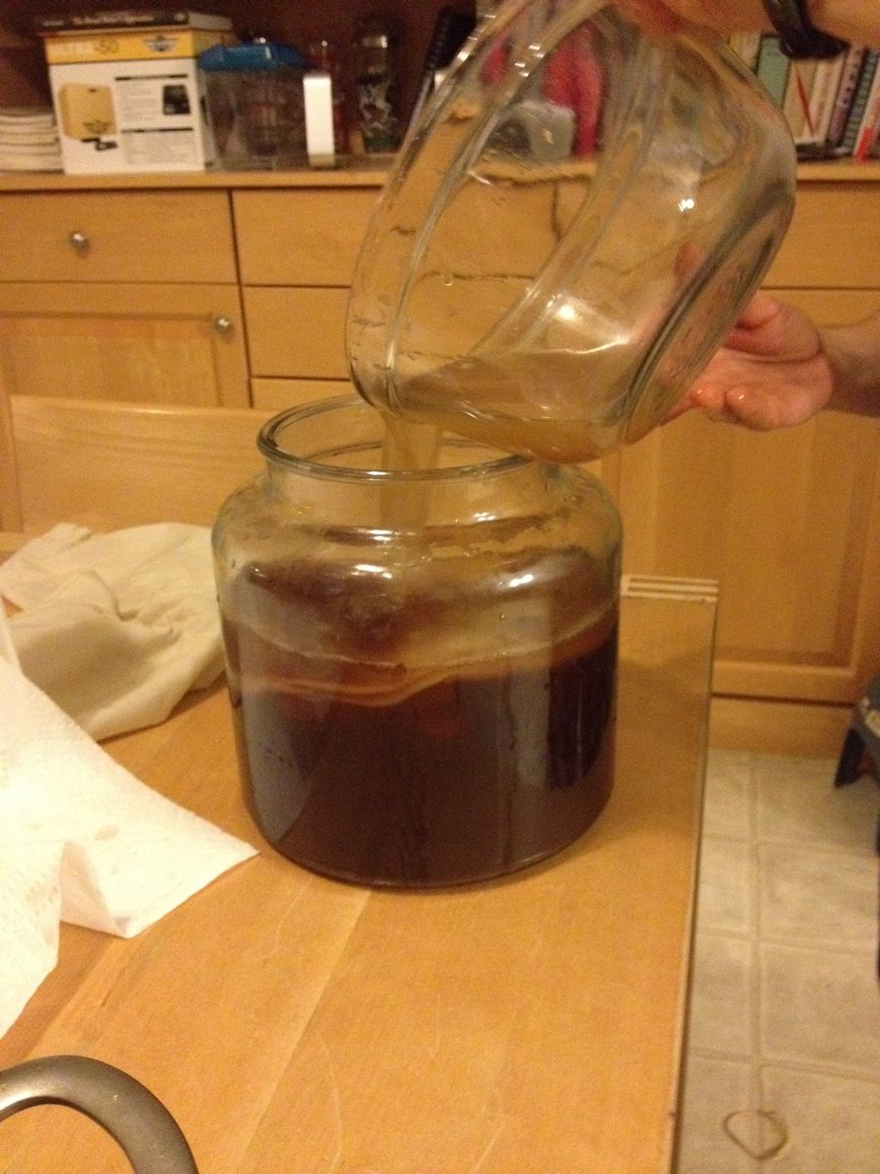 Now add the remaining liquid that was with the scoby that you set aside from the previous batch. That is the "starter liquid" for this batch.