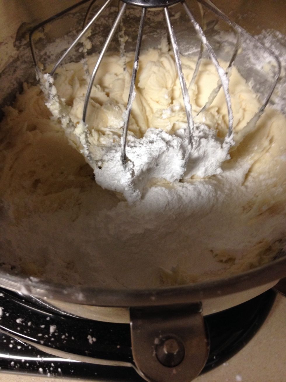 Now add the remaining sugar and then more milk until lightened in color and your preferred thickness for buttercream
