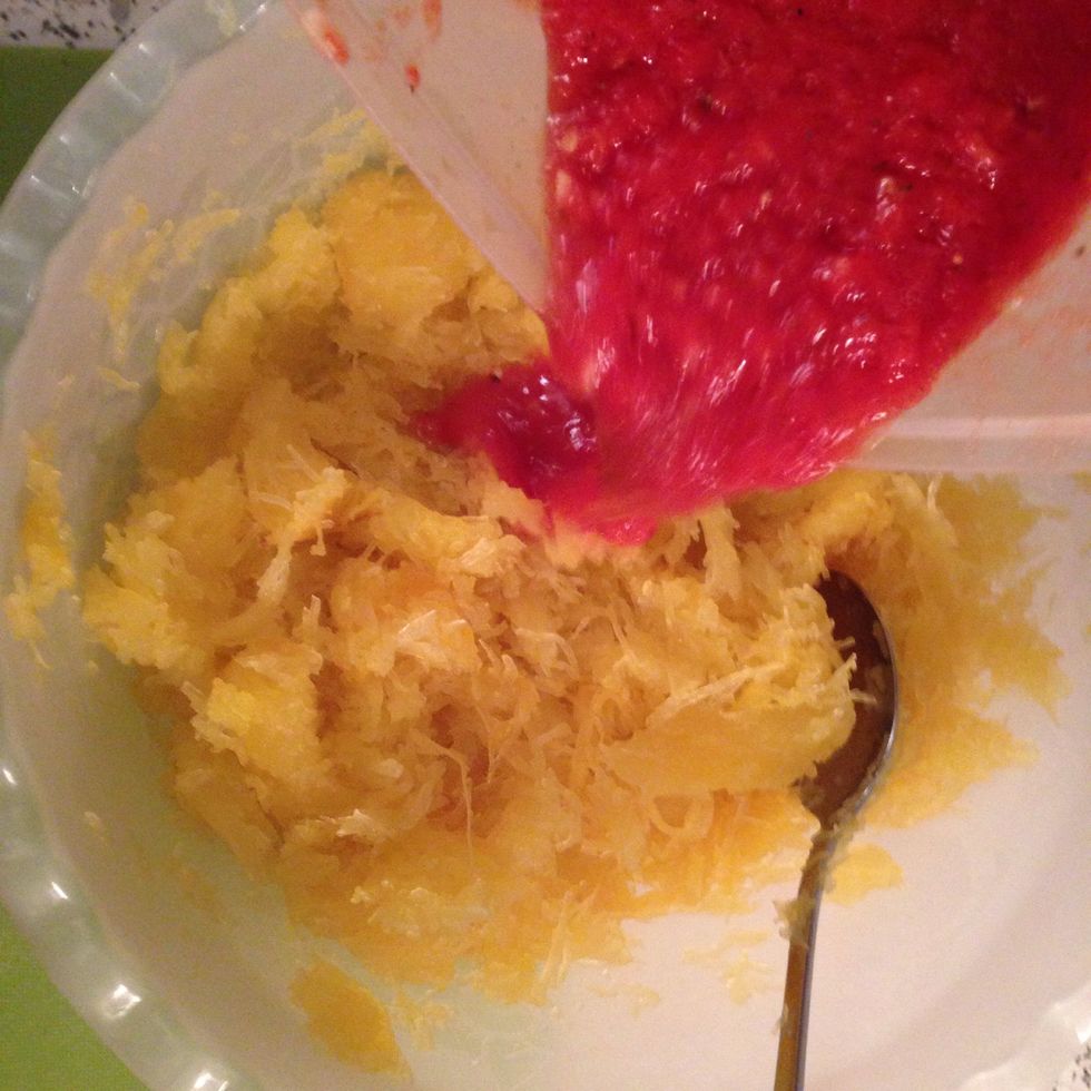 Now add the tomato sauce to the squash.