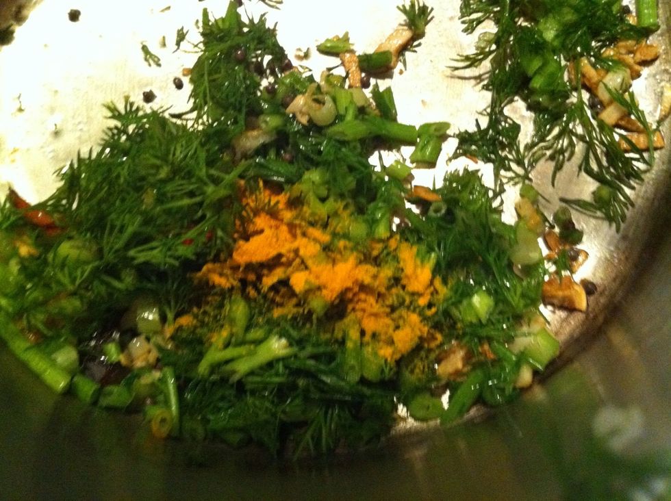 Now add the turmeric, asafetida & chopped dill.