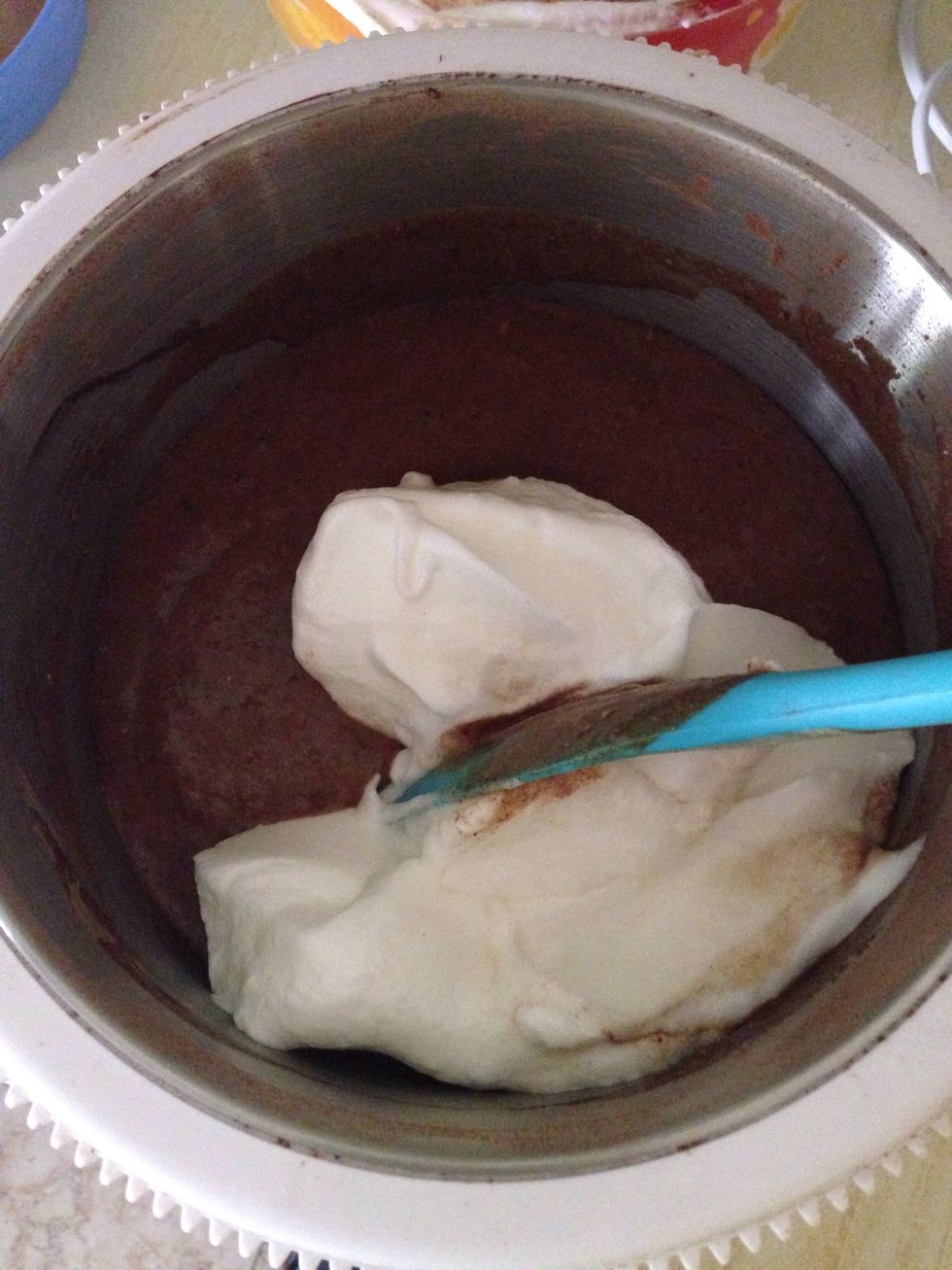 Now add the whites and the sifted flour alternating with each other