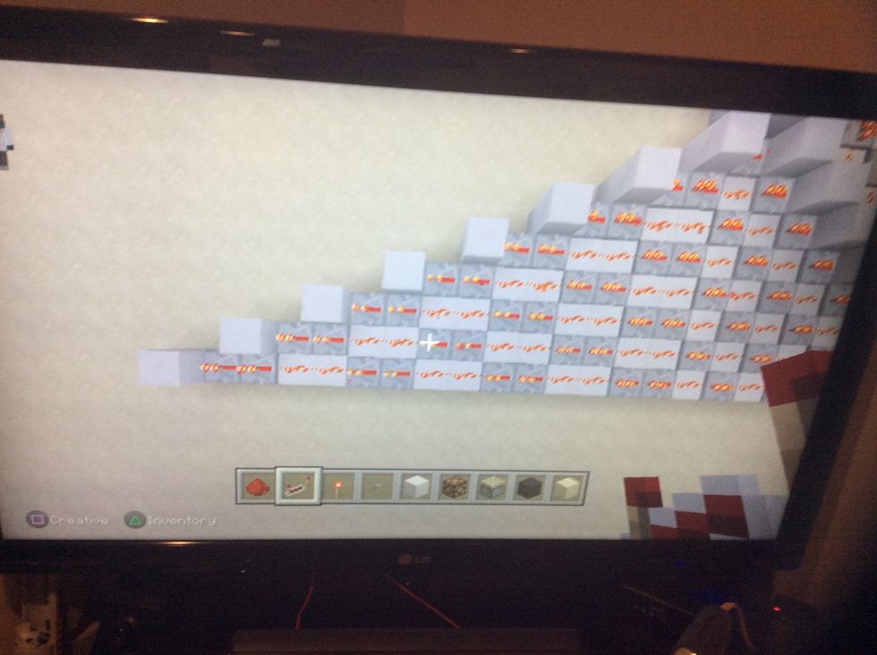 Now add this redstone and repeaters.