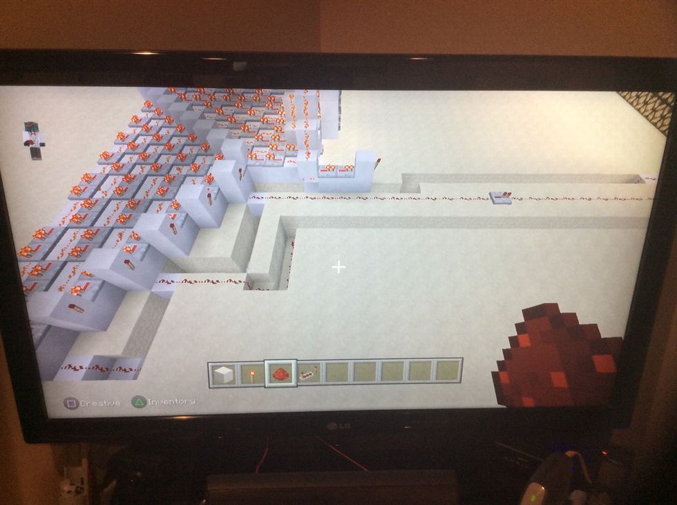 Now add this tunnel and redstone with repeaters as need again you can test in the same way as before.