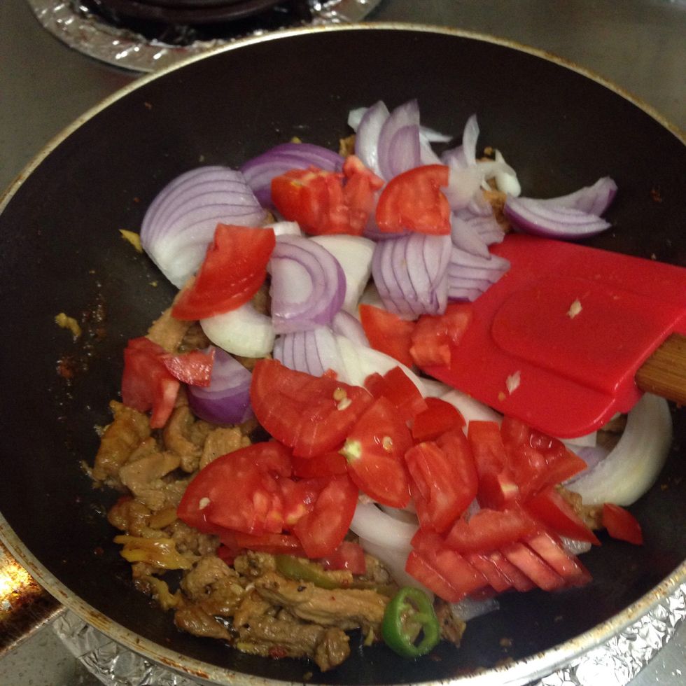 Now add tomatoes, onions and bell pepper. I run out of pepper so I didn't add any.