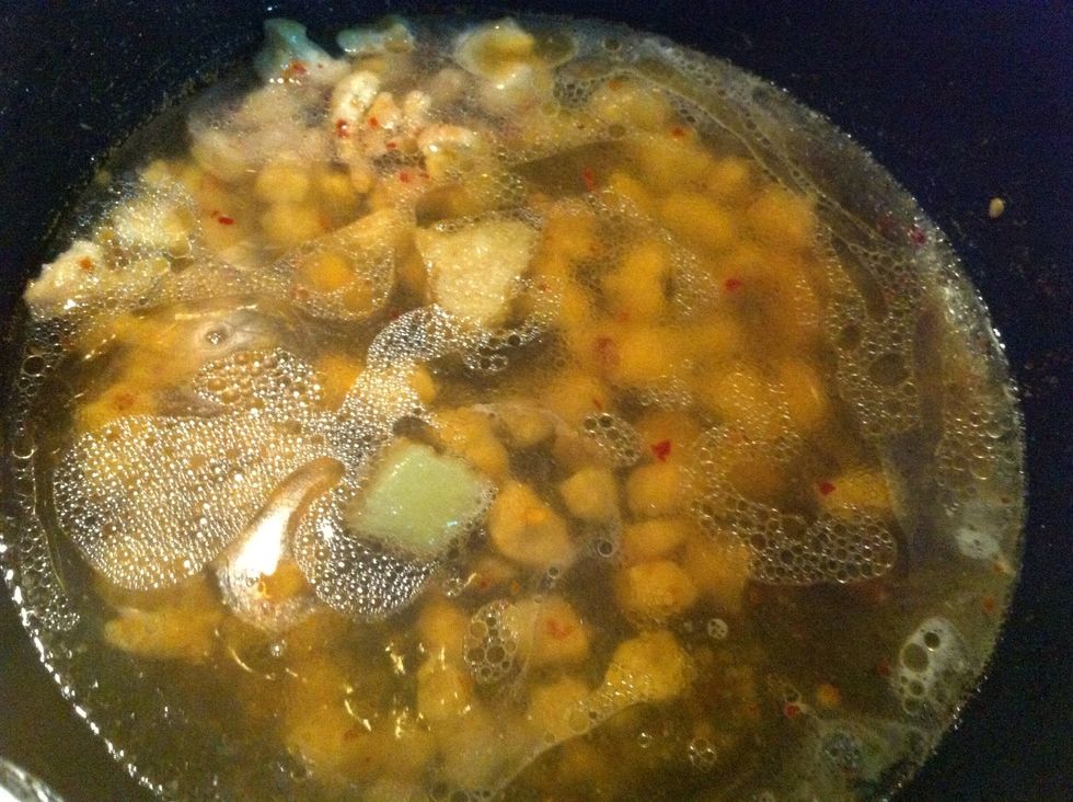 now add water, ginger and garlic cubes and let it cook