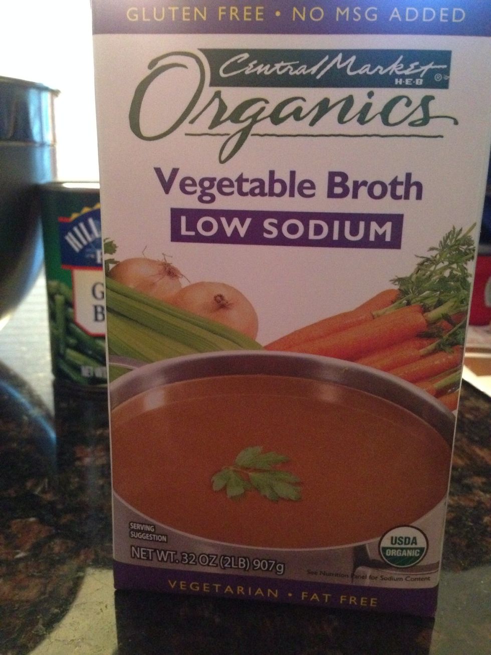 Now add your 4 cups vegetable broth ( you can use beef broth if you prefer). Also add 2 cups of water to the stock pot.
