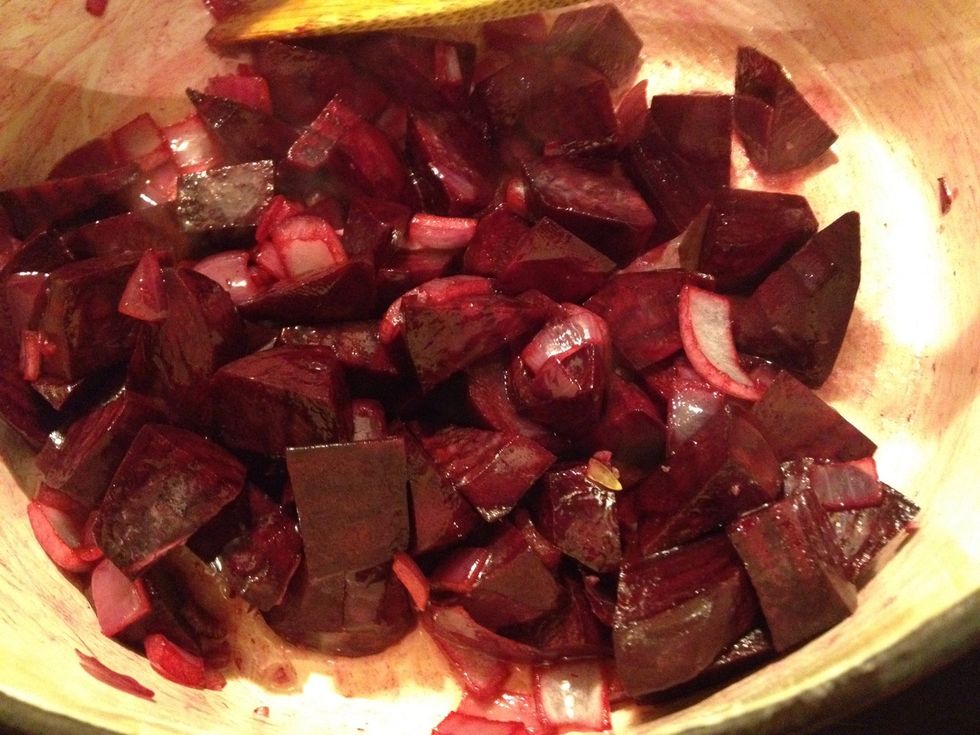 Now add your beetroot wedges and give it all a good stir. Turn the heat down to medium.