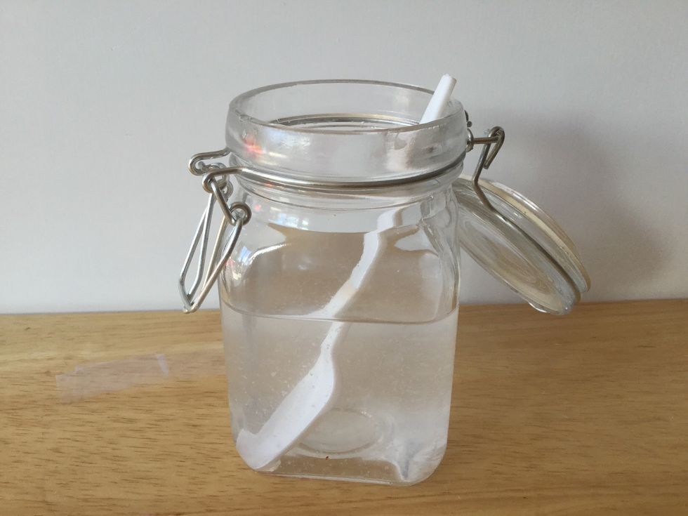 Now add your borax solution. Teaspoon of borax and a cup of warm water